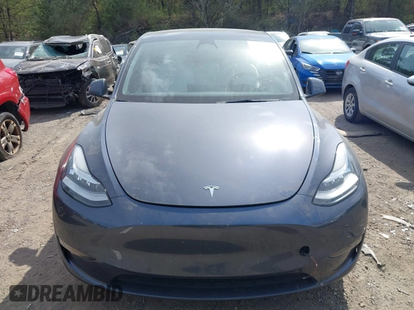 2022 Tesla Model Y Long Range z VIN 7SAYGDEE2NF447998, wystawiony jako IAAI lot #41704968 z przebiegiem 34 088 mil mil oraz . Historia ofert i sprzedaży dostępna na DreamBid. Obrazek 12.