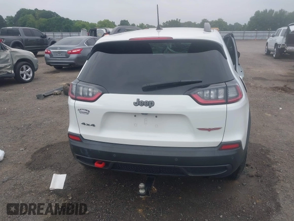 2021 Jeep Cherokee Trailhawk with VIN 1C4PJMBX4MD239112, listed as a IAAI auction lot 42271040 with 62,917 mi miles and . Bid and sale history available at DreamBid. Image 17.