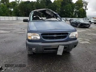2000 Ford Explorer XLS z VIN 1FMZU62X7YZA65813, wystawiony jako Copart lot #72015374 z przebiegiem 372 066 mil mil oraz Nie do naprawy • Non repairable. Historia ofert i sprzedaży dostępna na DreamBid. Obrazek 11.