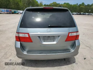 2007 Honda Odyssey EX-L with VIN 5FNRL38657B059033, listed as a Copart auction lot 54005495 with 212,674 mi miles and Salvage Title. Bid and sale history available at DreamBid. Image 6.