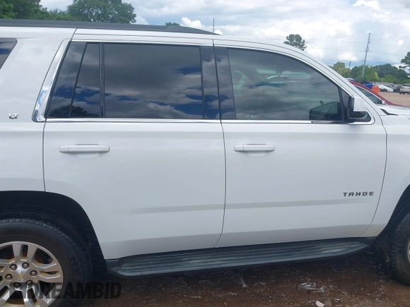 2016 Chevrolet Tahoe LT with VIN 1GNSKBKC0GR227451, listed as a IAAI auction lot 42241120 with 243,354 mi miles and . Bid and sale history available at DreamBid. Image 13.