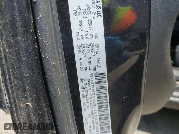 2015 Dodge Grand Caravan American Value with VIN 2C4RDGBG7FR703916, listed as a Copart auction lot 54830915 with 197,539 mi miles and Clean Title. Bid and sale history available at DreamBid. Image 13.