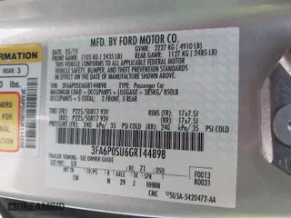 2016 Ford Fusion Energi Titanium with VIN 3FA6P0SU6GR144898, listed as a IAAI auction lot 41912557 with 173,415 mi miles. Bid and sale history available at carsss.com. Image 9.