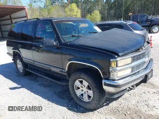 1999 Chevrolet Tahoe Z71 with VIN 1GNEK13R4XR101510, listed as a IAAI auction lot 41857800 with 309,007 mi miles and . Bid and sale history available at DreamBid. Image 1.