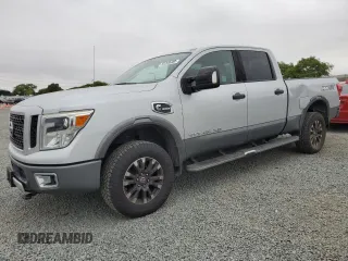 2017 Nissan Titan Pro-4X z VIN 1N6BA1F45HN543510, wystawiony jako Copart lot #58269895 z przebiegiem 185 557 mil mil oraz Szkody całkowita. Historia ofert i sprzedaży dostępna na DreamBid. Obrazek 1.