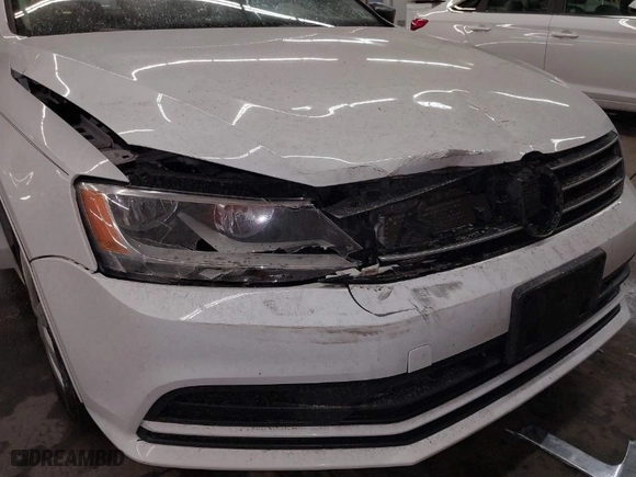 2016 Volkswagen Jetta Sedan 1.4T S with VIN 3VW267AJ1GM270446, listed as a IAAI auction lot 41702342 with 125,788 mi miles. Bid and sale history available at carsss.com. Image 6.
