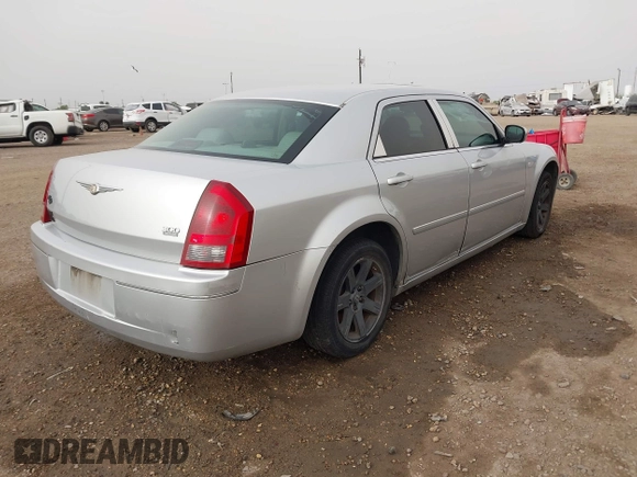 2006 Chrysler 300 Touring with VIN 2C3KA53G36H384442, listed as a IAAI auction lot 41817539 with 129,123 mi miles. Bid and sale history available at carsss.com. Image 4.