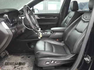 2021 Cadillac XT6 Premium Luxury with VIN 1GYKPDRS3MZ165049, listed as a Copart auction lot 45456145 with 57,112 mi miles and Salvage title. Bid and sale history available at DreamBid. Image 7.