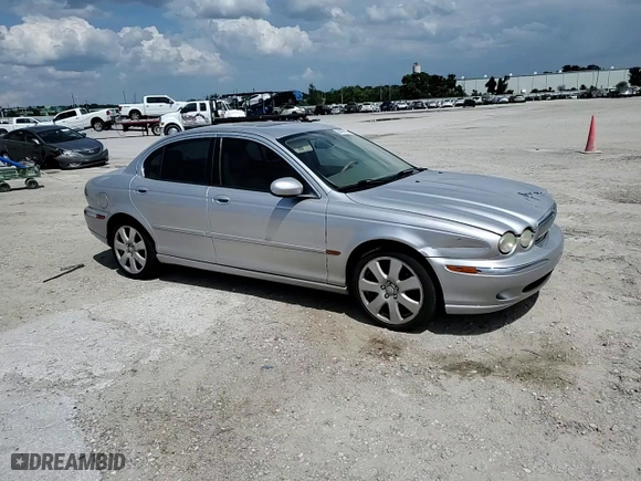 2005 Jaguar X-Type 3.0L with VIN SAJWA51C75WE23809, listed as a Copart auction lot 68457634 with 161,422 mi miles and Non Repairable. Bid and sale history available at carsss.com. Image 10.