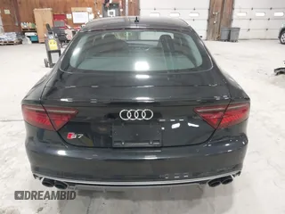 2016 Audi S7 with VIN WAUW2AFC5GN010917, listed as a IAAI auction lot 41785569 with 33,761 mi miles. Bid and sale history available at carsss.com. Image 16.