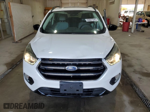 2017 Ford Escape SE with VIN 1FMCU9GD8HUA02240, listed as a Copart auction lot 55027345 with 75,468 mi miles and Salvage Title. Bid and sale history available at DreamBid. Image 5.
