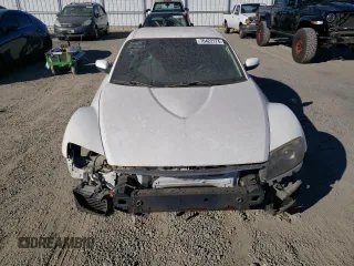 2005 Mazda RX-8 with VIN JM1FE173650147951, listed as a Copart auction lot 76422174 with Not Provided miles and Salvage Title. Bid and sale history available at carsss.com. Image 5.