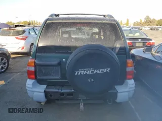 2004 Chevrolet Tracker ZR2 with VIN 2CNBJ734246907452, listed as a Copart auction lot 73102754 with 286,234 mi miles and Clean title. Bid and sale history available at DreamBid. Image 6.