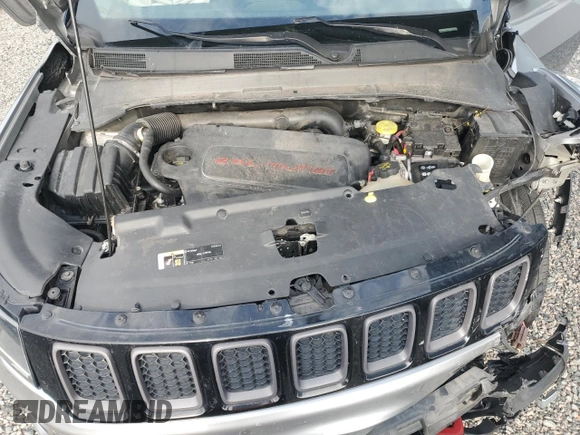 2018 Jeep Compass Trailhawk with VIN 3C4NJDDB3JT168841, listed as a Copart auction lot 59009415 with 130,752 mi miles and Salvage title. Bid and sale history available at DreamBid. Image 12.