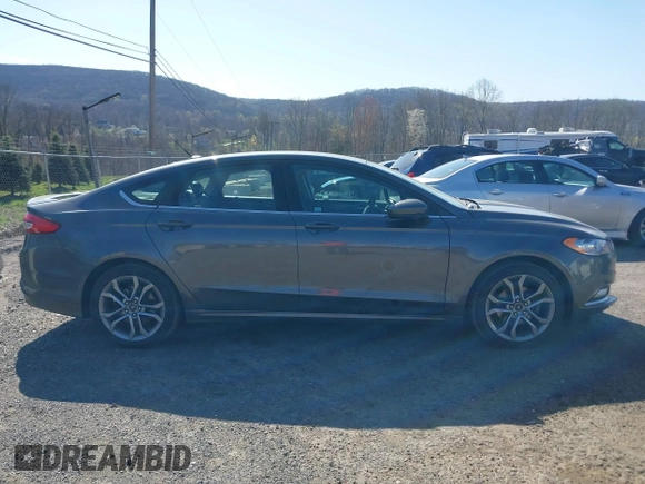 2017 Ford Fusion SE z VIN 3FA6P0HD8HR211638, wystawiony jako IAAI lot #42029399 z przebiegiem 90 262 mil mil oraz . Historia ofert i sprzedaży dostępna na DreamBid. Obrazek 13.