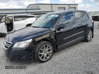 2011 Volkswagen Tiguan SE with VIN WVGBV7AX6BW514476, listed as a Copart auction lot 77448064 with 187,087 mi miles and Salvage title. Bid and sale history available at DreamBid. Image 1.