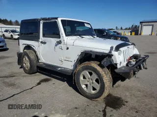 2014 Jeep Wrangler Sahara with VIN 1C4AJWBGXEL125544, listed as a Copart auction lot 51961845 with 146,917 mi miles and Salvage title. Bid and sale history available at DreamBid. Image 4.