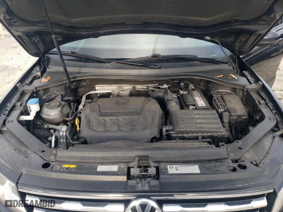 2018 Volkswagen Tiguan S with VIN 3VV1B7AXXJM105874, listed as a Copart auction lot 86565734 with 100,901 mi miles and Salvage Title. Bid and sale history available at carsss.com. Image 12.