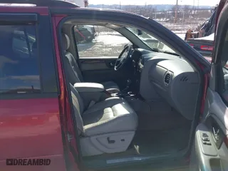 2006 GMC Envoy Denali with VIN 1GKET63M862286213, listed as a IAAI auction lot 41616911 with 0 mi miles. Bid and sale history available at carsss.com. Image 5.