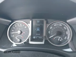 2023 Toyota Tacoma SR with VIN 3TMCZ5AN2PM642205, listed as a IAAI auction lot 42167945 with 10,595 mi miles and . Bid and sale history available at DreamBid. Image 7.