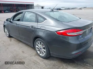 2017 Ford Fusion SE with VIN 3FA6P0H7XHR228922, listed as a IAAI auction lot 42162345 with 186,000 mi miles and . Bid and sale history available at DreamBid. Image 3.