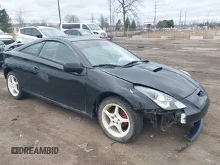 2000 Toyota Celica GT with VIN JTDDR32T7Y0006809, listed as a IAAI auction lot 41860933 with 262,014 mi miles. Bid and sale history available at carsss.com. Image 1.