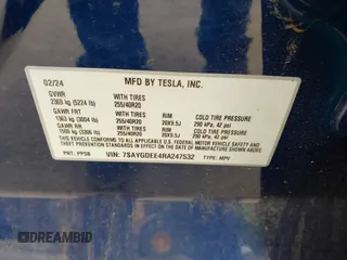 2024 Tesla Model Y Long Range z VIN 7SAYGDEE4RA247532, wystawiony jako IAAI lot #42205480 z przebiegiem 21 273 mil mil oraz . Historia ofert i sprzedaży dostępna na DreamBid. Obrazek 9.