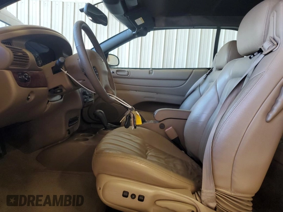 2003 Chrysler Sebring with VIN 1C3EL55TX3N564490, listed as a Copart auction lot 84219524 with 50,290 mi miles and Salvage Title. Bid and sale history available at DreamBid. Image 7.
