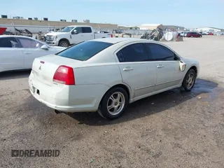 2004 Mitsubishi Galant ES z VIN 4A3AB36F14E132394, wystawiony jako IAAI lot #41946982 z przebiegiem 167 162 mil mil oraz . Historia ofert i sprzedaży dostępna na DreamBid. Obrazek 4.