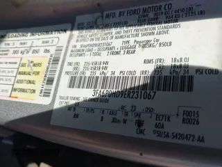 2014 Ford Fusion SE with VIN 3FA6P0HD9ER231067, listed as a IAAI auction lot 41946109 with 265,233 mi miles. Bid and sale history available at carsss.com. Image 9.