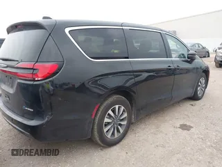 2023 Chrysler Pacifica Hybrid Touring L z VIN 2C4RC1L77PR631132, wystawiony jako IAAI lot #42391834 z przebiegiem 61 868 mil mil oraz . Historia ofert i sprzedaży dostępna na DreamBid. Obrazek 4.