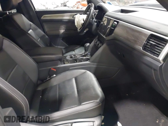 2022 Volkswagen Atlas SE z VIN 1V2KE2CA1NC206765, wystawiony jako IAAI lot #41876747 z przebiegiem 83 304 mil mil oraz . Historia ofert i sprzedaży dostępna na DreamBid. Obrazek 5.