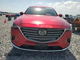 2023 Mazda CX-9 Grand Touring z VIN JM3TCBDY4P0633408, wystawiony jako Copart lot #57242685 z przebiegiem 28 859 mil mil oraz Szkoda całkowita • Salvage title. Historia ofert i sprzedaży dostępna na DreamBid. Obrazek 5.