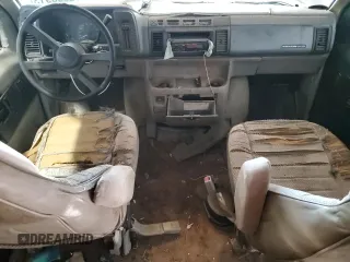 1993 GMC Safari z VIN 1GKDM15W6PB504662, wystawiony jako Copart lot #72306913 z przebiegiem 333 276 mil mil oraz Tytuł czysty. Historia ofert i sprzedaży dostępna na DreamBid. Obrazek 8.