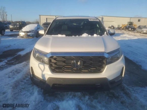 2024 Honda Passport EX-L with VIN 5FNYF8H52RB014593, listed as a Copart auction lot 87750545 with 6,081 mi miles and Salvage Title. Bid and sale history available at carsss.com. Image 5.