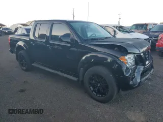 2020 Nissan Frontier Pro-4X with VIN 1N6ED0EB5LN706454, listed as a Copart auction lot 87322024 with 31,598 mi miles and Salvage title. Bid and sale history available at DreamBid. Image 4.