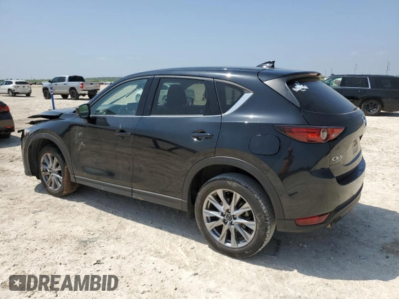 2021 Mazda CX-5 Grand Touring with VIN JM3KFADM5M0479247, listed as a Copart auction lot 51219915 with 33,384 mi miles and Salvage Title. Bid and sale history available at carsss.com. Image 2.