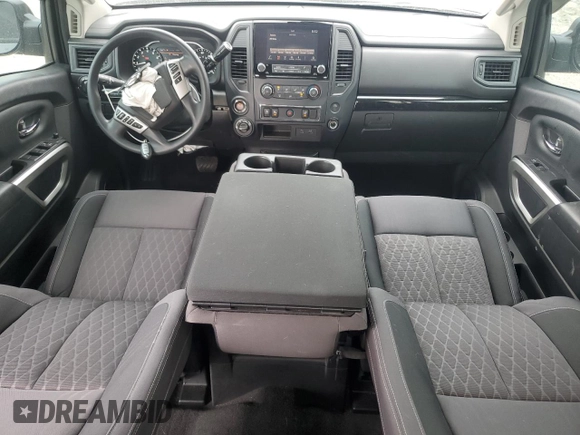 2022 Nissan Titan S with VIN 1N6AA1EC9NN106299, listed as a Copart auction lot 58061355 with 49,910 mi miles and Salvage title. Bid and sale history available at DreamBid. Image 8.