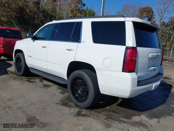 2019 Chevrolet Tahoe LT with VIN 1GNSKBKC7KR307869, listed as a IAAI auction lot 41833834 with 127,949 mi miles. Bid and sale history available at carsss.com. Image 3.