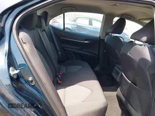 2019 Toyota Camry LE with VIN 4T1B11HK6KU276644, listed as a IAAI auction lot 42037249 with 23,677 mi miles and . Bid and sale history available at DreamBid. Image 8.