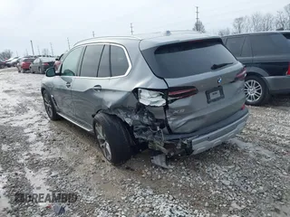 2025 BMW X5 xDrive40i with VIN 5UX23EU02S9X44610, listed as a IAAI auction lot 41469794 with 1,964 mi miles. Bid and sale history available at carsss.com. Image 3.