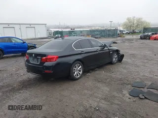 2016 BMW 5 Series 528i xDrive with VIN WBA5A7C53GG149942, listed as a IAAI auction lot 41985753 with 115,200 mi miles. Bid and sale history available at carsss.com. Image 4.