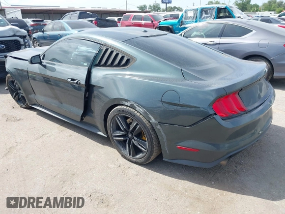 2016 Ford Mustang EcoBoost z VIN 1FA6P8TH0G5289907, wystawiony jako IAAI lot #42057565 z przebiegiem 129 917 mil mil oraz . Historia ofert i sprzedaży dostępna na DreamBid. Obrazek 3.