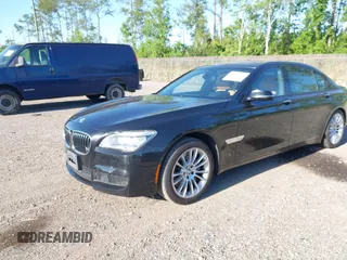 2015 BMW 7 Series 750Li with VIN WBAYE8C50FD781384, listed as a IAAI auction lot 42049829 with 128,087 mi miles and . Bid and sale history available at carsss.com. Image 2.