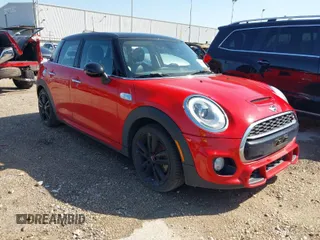 2015 MINI Hardtop 4 Door S z VIN WMWXU3C53F2B56364, wystawiony jako IAAI lot #41776582 z przebiegiem 58 062 mil mil oraz . Historia ofert i sprzedaży dostępna na DreamBid. Obrazek 1.