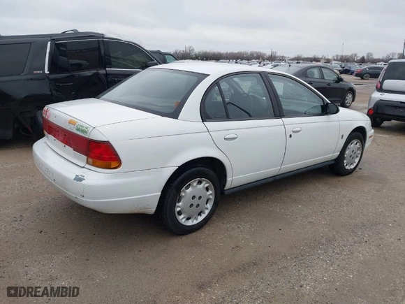 1997 Saturn SL with VIN 1G8ZK5274VZ196952, listed as a IAAI auction lot 41514958 with 125,683 mi miles. Bid and sale history available at carsss.com. Image 4.