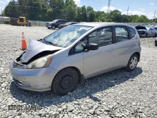2009 Honda Fit with VIN JHMGE88229S032940, listed as a Copart auction lot 55822055 with 252,247 mi miles and Salvage title. Bid and sale history available at DreamBid. Image 1.