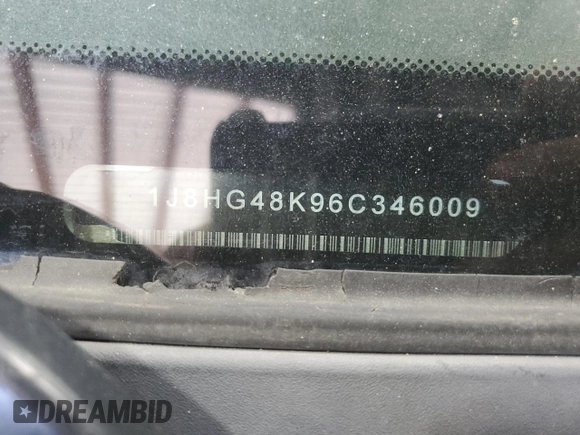 2006 Jeep Commander z VIN 1J8HG48K96C346009, wystawiony jako Copart lot #60691615 z przebiegiem 150 025 mil mil oraz Czysty tytuł • Clean title. Historia ofert i sprzedaży dostępna na DreamBid. Obrazek 13.