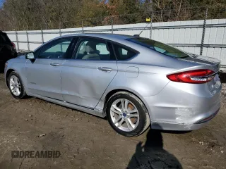 2018 Ford Fusion Hybrid SE with VIN 3FA6P0LU9JR208728, listed as a Copart auction lot 43519495 with 183,976 mi miles and Clean Title. Bid and sale history available at carsss.com. Image 2.