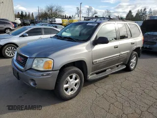 2005 GMC Envoy SLE with VIN 1GKDS13S952104730, listed as a Copart auction lot 47778585 with 187,712 mi miles and Salvage Title. Bid and sale history available at carsss.com. Image 1.